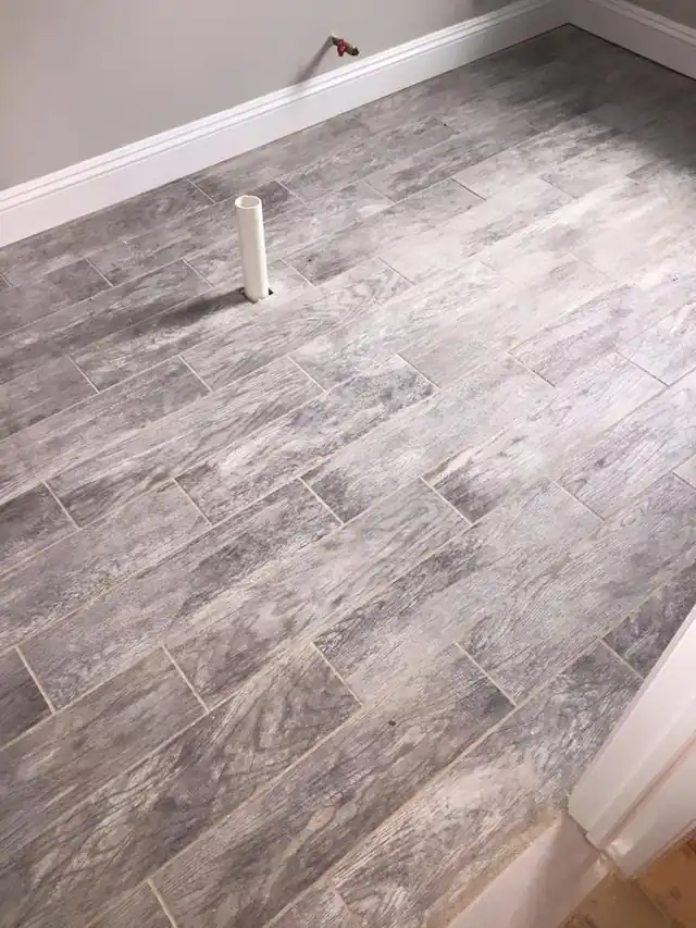 New gray plank-look floor tile